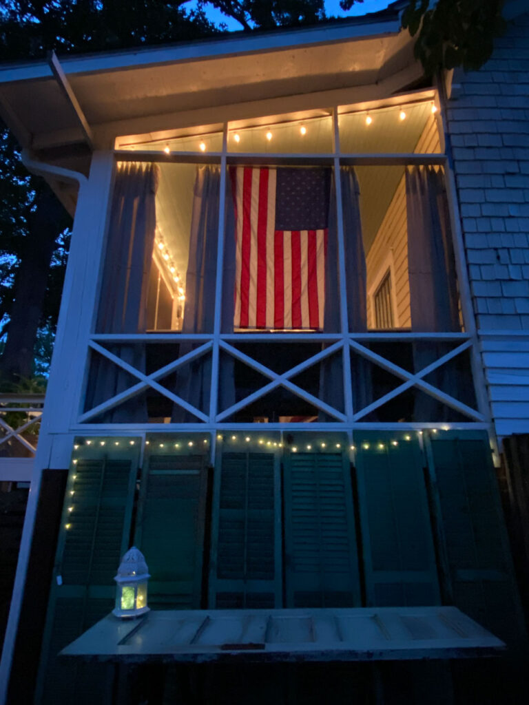 Screened Porch with String Lights at Night